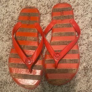 Orange & brown Michael Kores flip flops